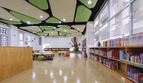 兒童閱覽室的門與後方的南興幼兒園相通聯,孩童可以來這裡做功課、閱讀故事書,是一座親切、活絡、合宜的地方圖書館。