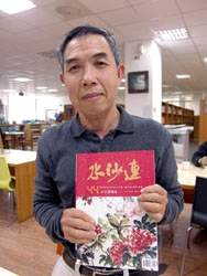 涂進萬主任是圖書館的靈魂人物。